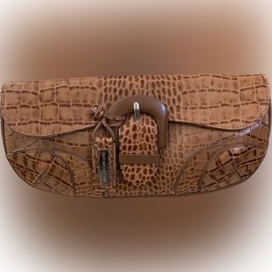 Antonio Melani leather clutch/purse. Measures 11”x5.5”x 1.5”.